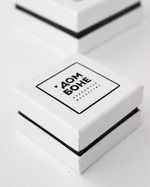 Футляр картонный 60x60x36 мм с флокированным ложементом.