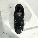 New Balance 1000 • Black