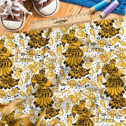 Ткань муслин хохлома из золотых жар-птиц на белом фоне