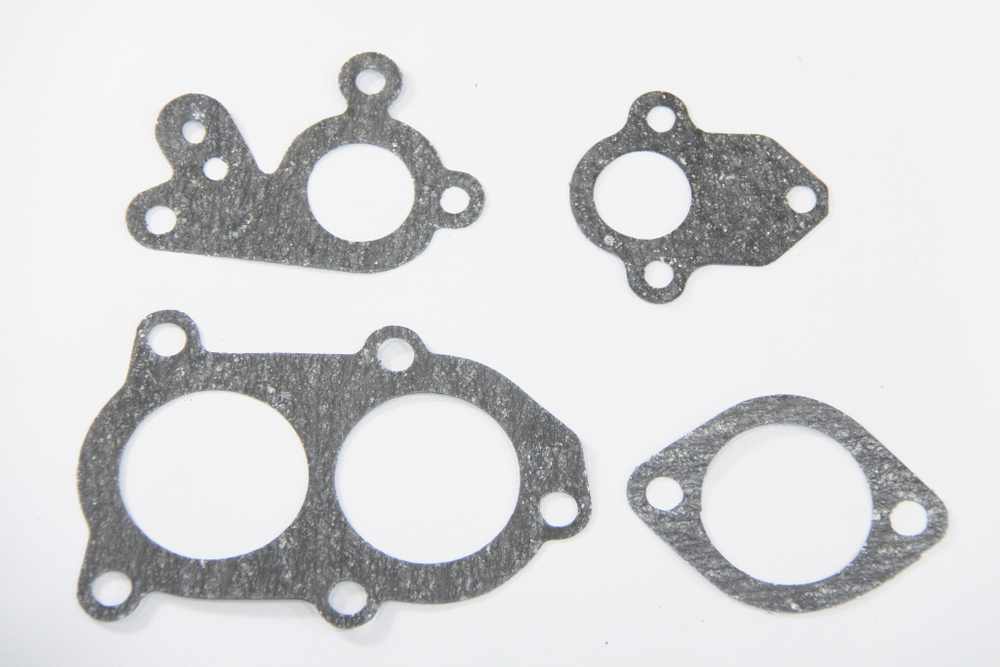 Набор прокладок водяной коробки КАМАЗ (4 наим.) паронит 0,6мм. (740-1303000-01У_4Н Состав: 740-1303024, 740-1303188, 740-1303198, 740-1303214) (Москва) ( ОЕ 03-15-200 )