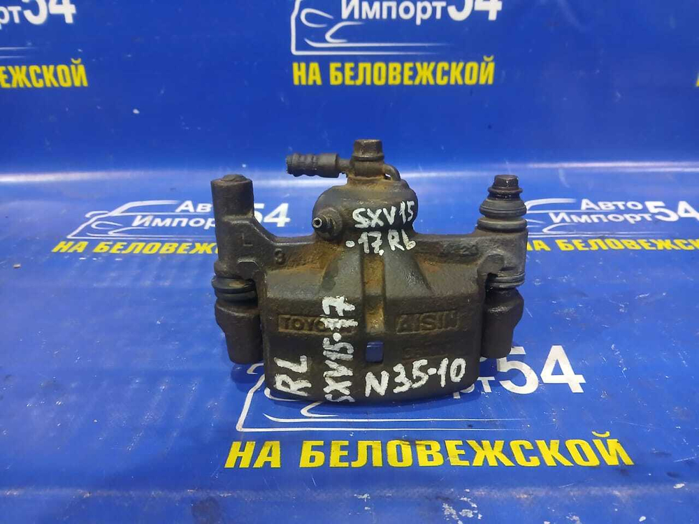 Суппорт тормозной задний левый TOYOTA SCEPTER 1994
