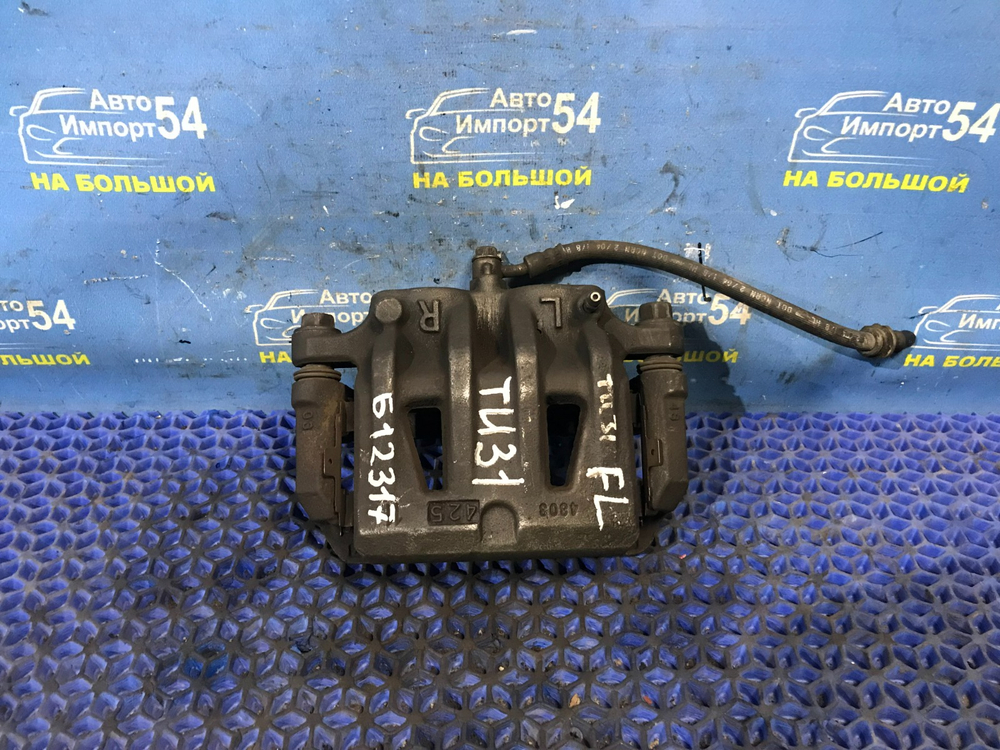 Суппорт тормозной передний левый NISSAN PRESAGE 2003-2009