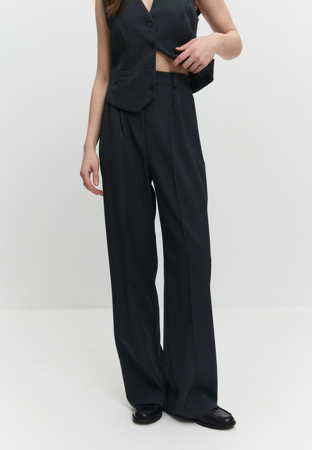 Брюки с простроченными стрелками