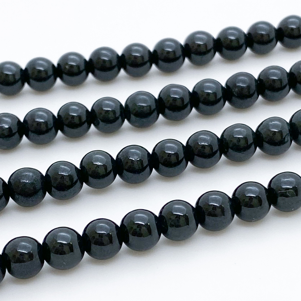 Жадеит, диаметр 5,8-6 мм, цена за 16 шт (1/4 нити)