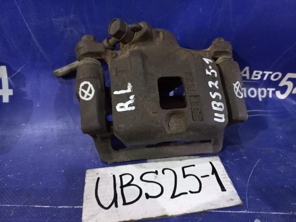 Суппорт тормозной задний левый ISUZU BIGHORN 1994