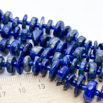 Лазурит бусины, галтовка, размер около 9-10*2-4,5 мм, цена за отрезок 19 см (1/2 нити)