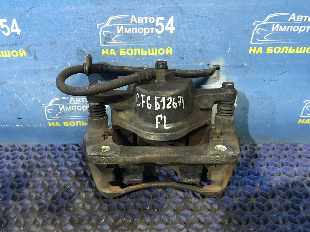 Суппорт тормозной передний левый Honda ACCORD 1997-2003