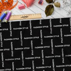 Ткань шелк Армани стильная клетка из белых надписей на чёрном фоне