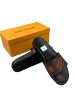 Шлепанцы Louis Vuitton