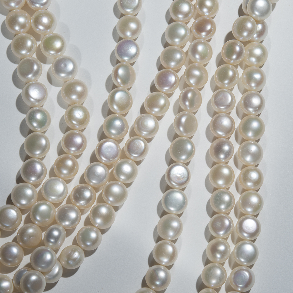 Жемчуг штучный культивированный "Булочка" A+ Grade, белый, 9,5мм