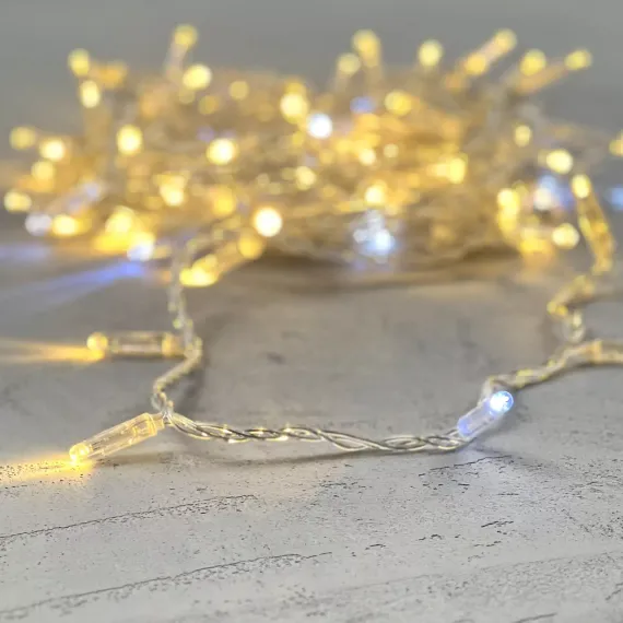 Светодиодная гирлянда с колпачком 100 теплых белых LED ламп 10 м., мерцание, 24В., прозрачный провод ПВХ, IP65, LTC (PST100BLWCAP-10-1WW)