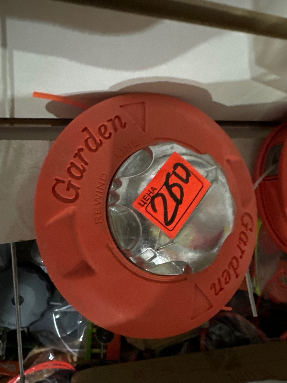 Катушка на триммер оранжевый