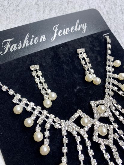 Комплект бижутерии (колье, серьги, браслет, кольцо)