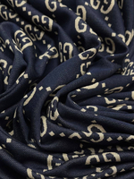 Трикотаж хлопковый Gucci синий с крупным дизайнерским принтом