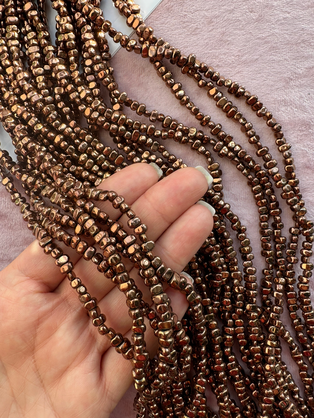 Нить гематитовых бусин 5-6мм, галтовка