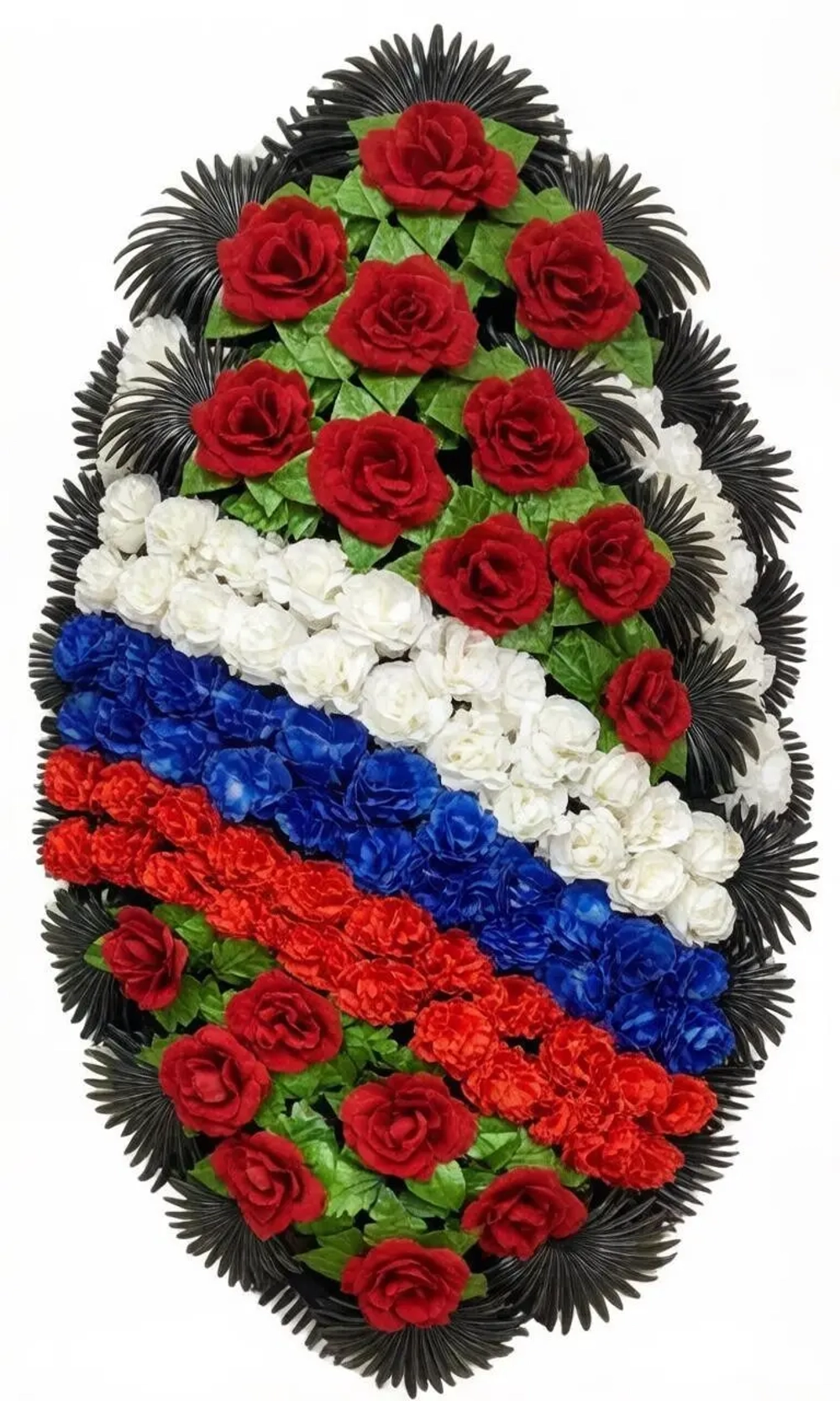 Искусственный ритуальный венок на возложение с диагональными полосами белых, синих и красных цветов в цветах российского флага, красными розами и черной бахромой