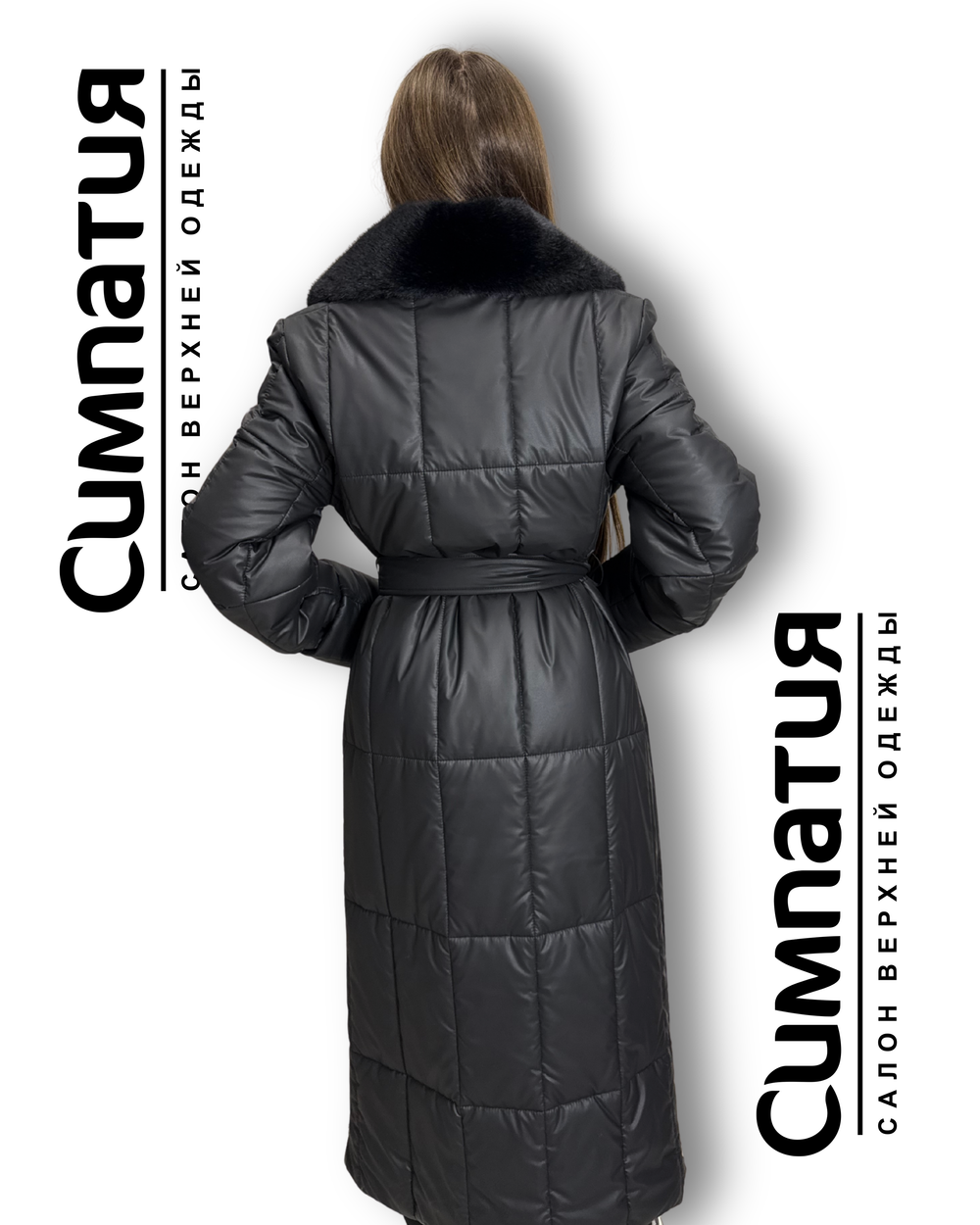 Стильное пальто в черном цвете с декоративными деталями