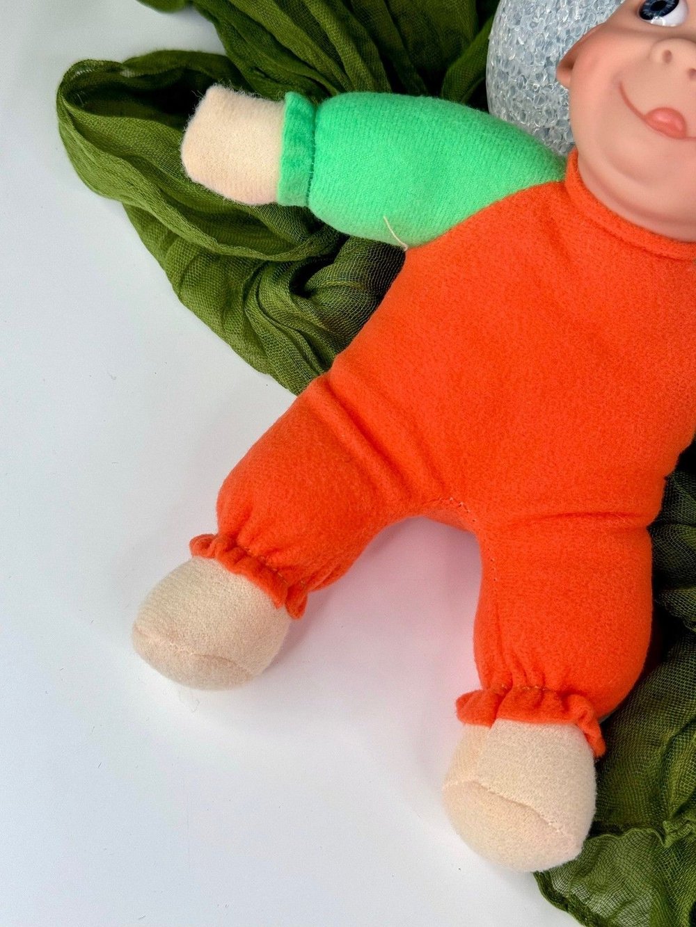 Кукла LAMAGIK мягконабивная 23см Caritas (304U2)