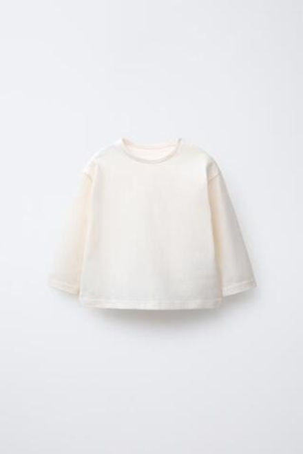 ZARA ОДНОТОННАЯ ФУТБОЛКА С ДЛИННЫМИ РУКАВАМИ, ЭКРЮ
