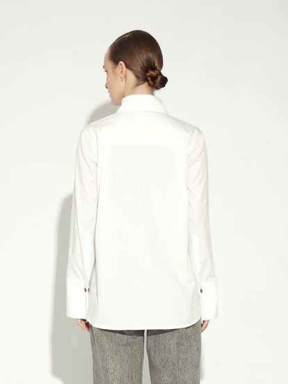 Женская блузка белого цвета из хлопка - фото 4