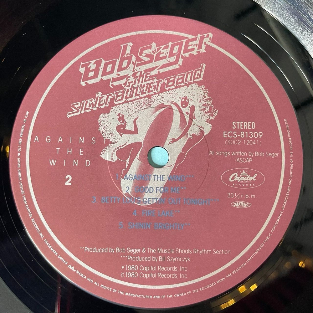 Винтажная виниловая пластинка LP Bob Seger and The Silver Bullet Band Against The Wind (Japan 1980) (Obi)