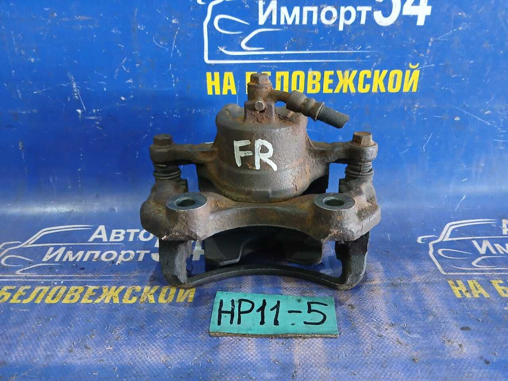 Суппорт тормозной передний правый NISSAN PRIMERA 1998