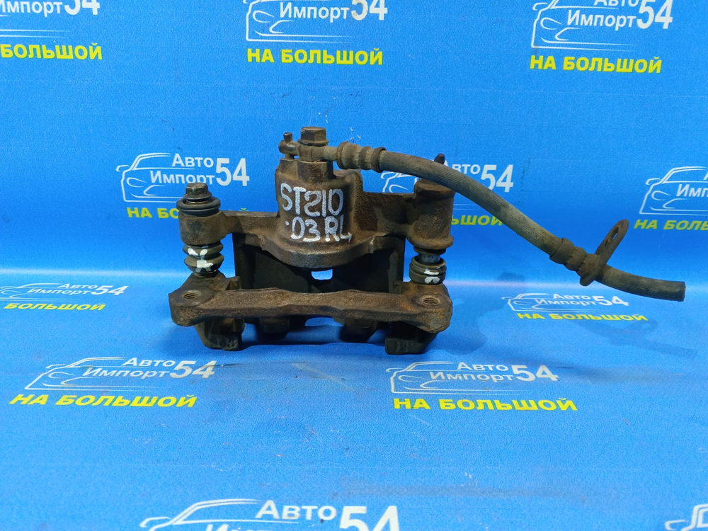 Суппорт тормозной задний левый TOYOTA CORONA PREMIO 1999