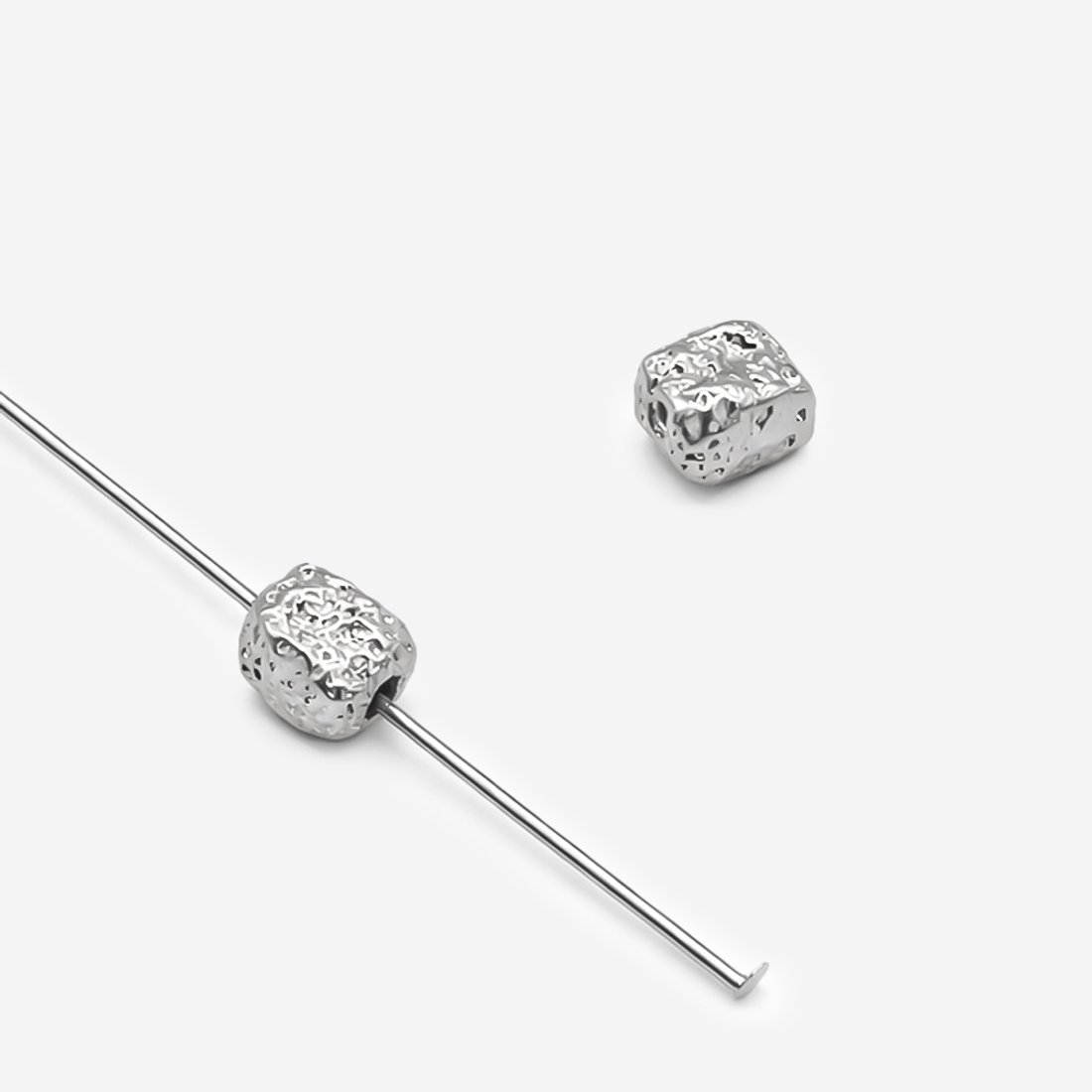 Бусина-разделитель в форме камушка 7*5,5мм, родирование