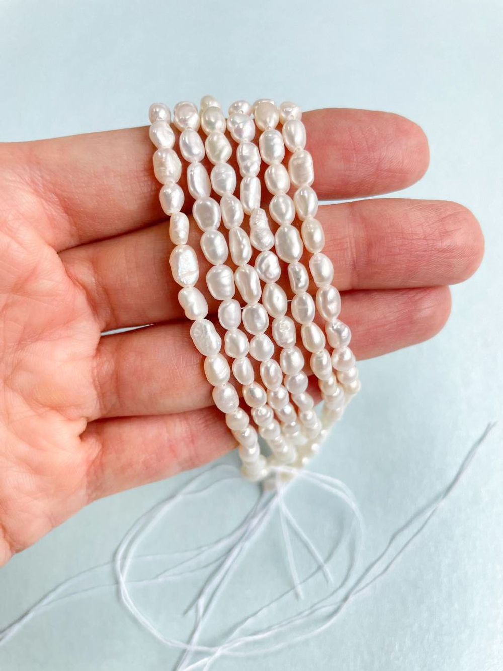 26536-4 Жемчуг натуральный 6*8мм, нить 34см