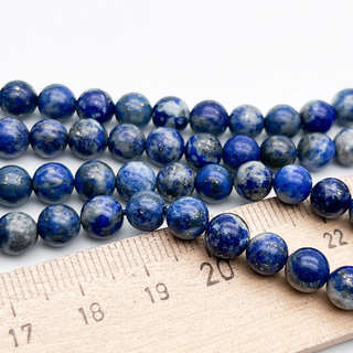 Лазурит бусины, диаметр около 6,3-6,5 мм, цена за 15 шт (1/4 нити)