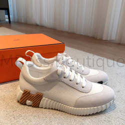 Женские кроссовки Hermes Bouncing белого цвета с черными и коричневыми буквами на подошве