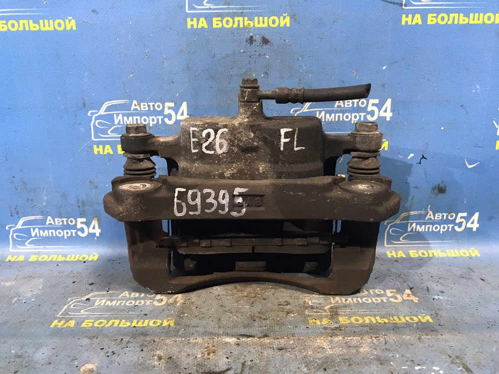 Суппорт тормозной передний левый NISSAN CARAVAN 2012-2017