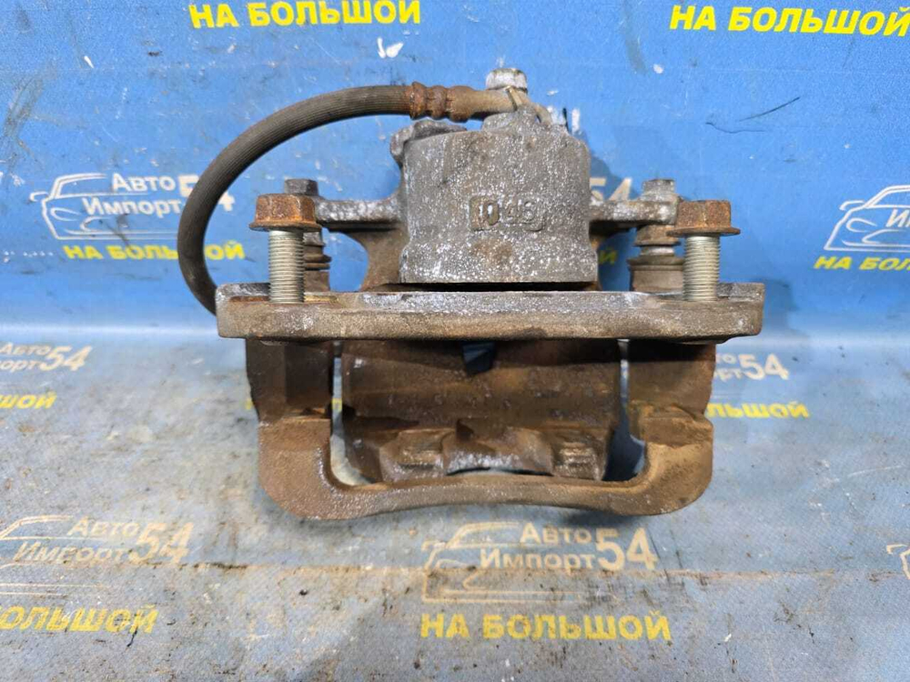 Суппорт тормозной передний левый TOYOTA RAV4 2005-2013