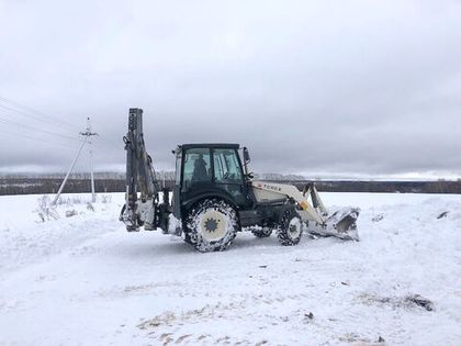 Уборка снежных валов на подъездной дороге