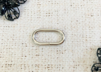 Рамка металлическая овальная ш. 25 мм