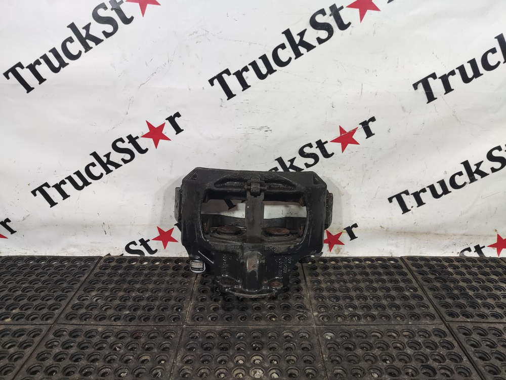 Суппорт задний левый