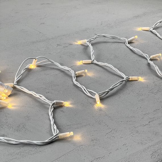 Светодиодная гирлянда с колпачком 75 теплых белых LED ламп 10 м., 24В., белый каучуковый провод, IP65, LTC (LL75-8-1WW)