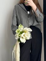 Свадебный букет из калл, антирринума, диантусов и амаранта