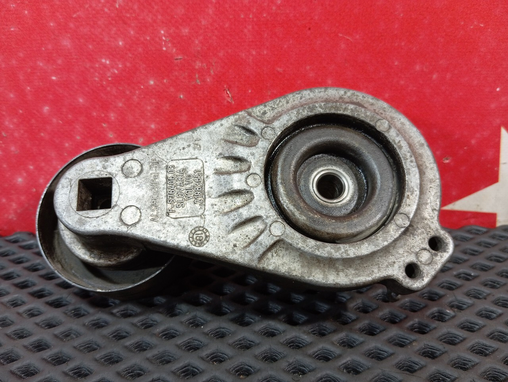 Ролик-натяжитель приводного ремня