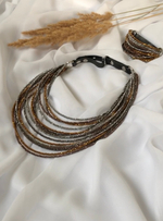 Колье каскад "Венеция" из венец.стекла,оттенки:золото,серебро,черный,коньяк,застежка из натур.кожи