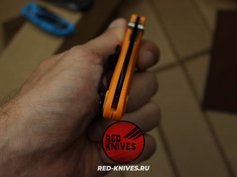 Нож Benchmade 556 Griptilian Mini - оранж нейлон, клинок черный RK/Н39