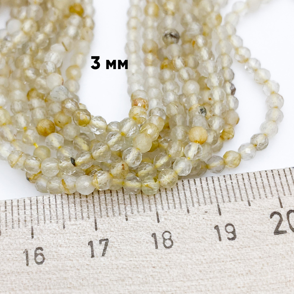 Кварц рутиловый граненый, размер около 3-3,2 мм, цена за 63-64 шт (1/2 нити)