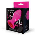 Розовая вибровтулка с красным кристаллом и пультом ДУ - 9 см. (Цвет: красный)