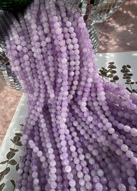 Нить бусин из тонированного кварца 6мм, гладкие