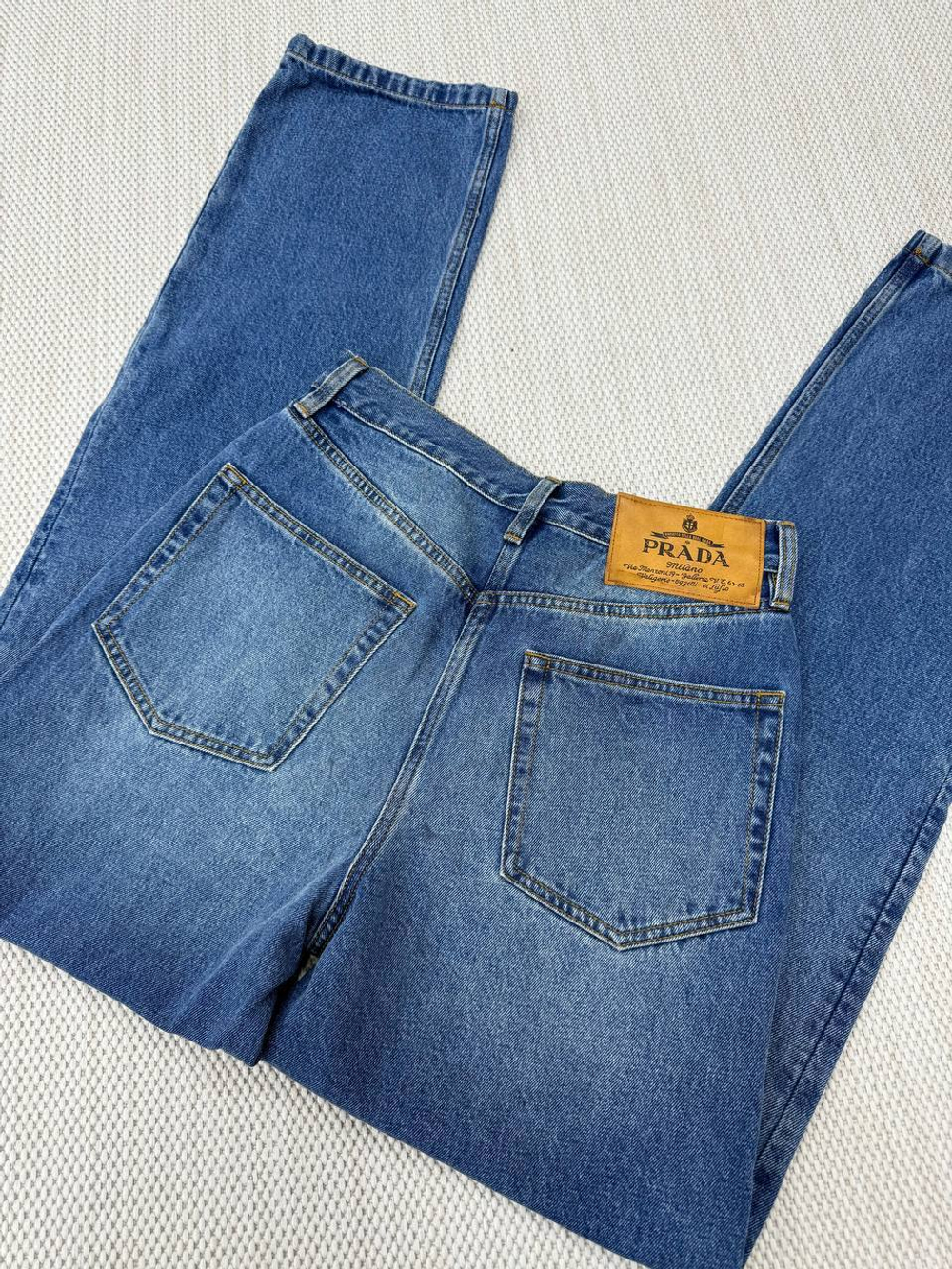 Джинсы Prada
