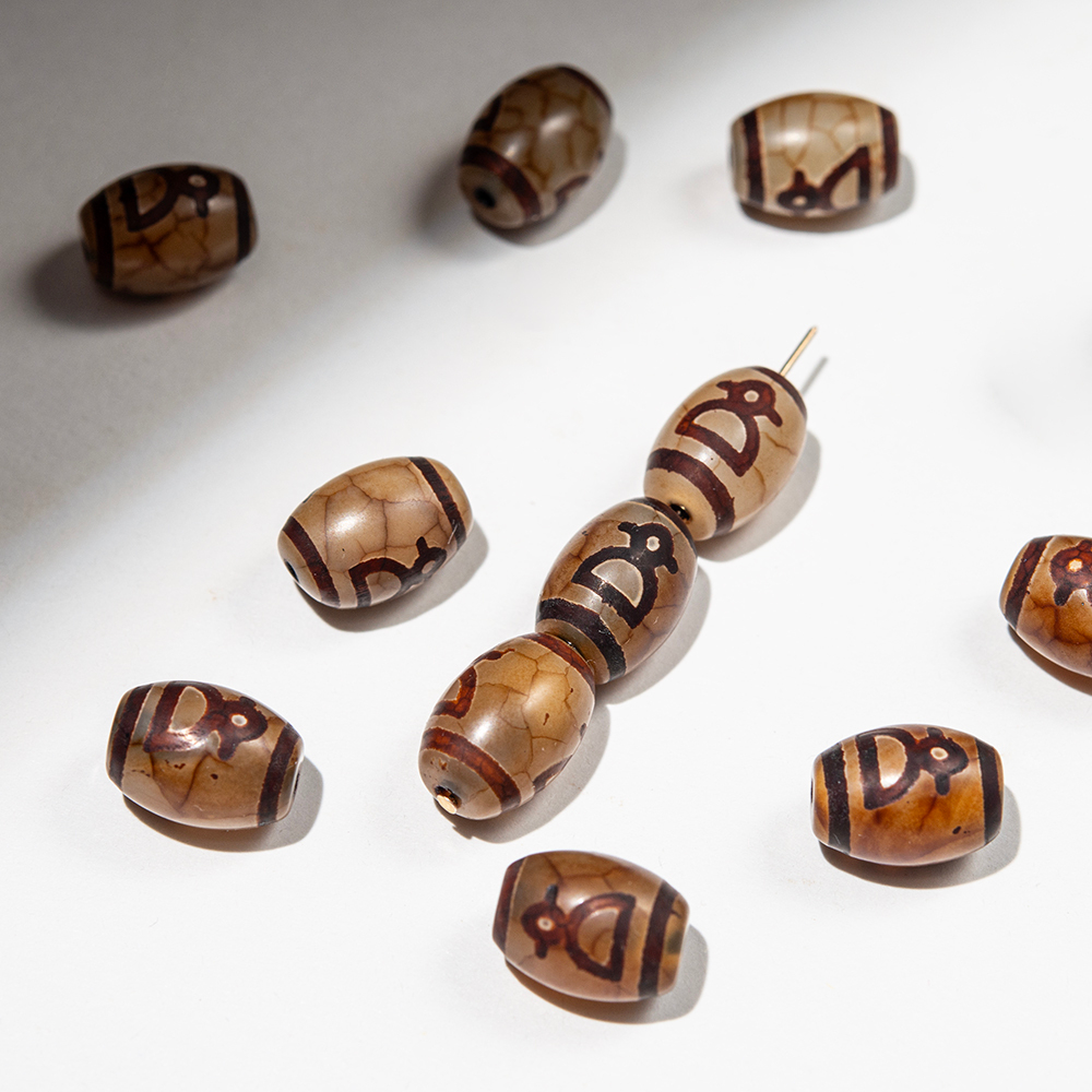 Бусина Дзи "Бог богатства" из агата, 10*14мм, коричневый