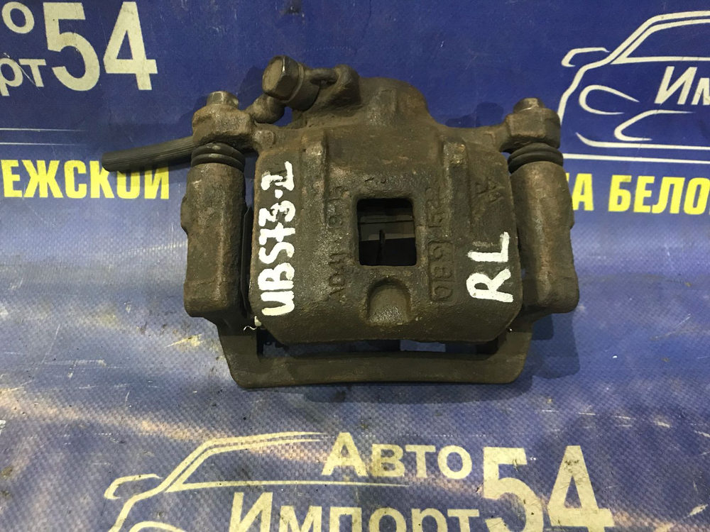 Суппорт тормозной задний левый ISUZU BIGHORN 2001