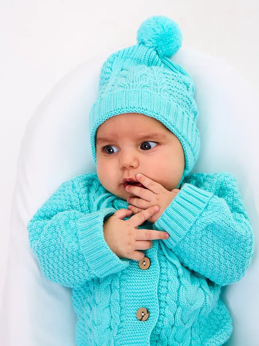 вязаный комбинезон для новорожденных