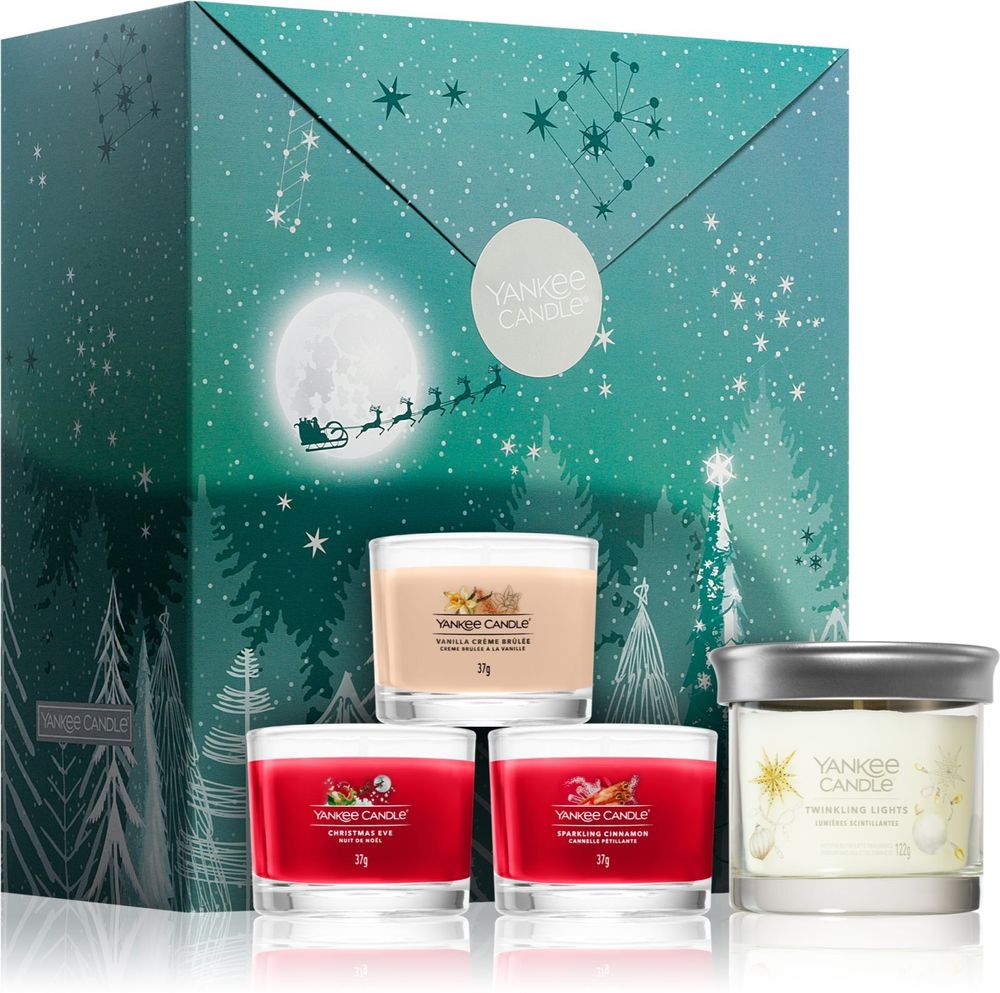 Yankee Candle Twinkling Lights scented candle 122 г + Christmas Eve votive candle 37 г + Sparkling Cinnamon votive candle 37 г + Vanilla Crème Brûlée votive candle 37 г Bright Lights 3 Votives &amp; 1 Tumbler