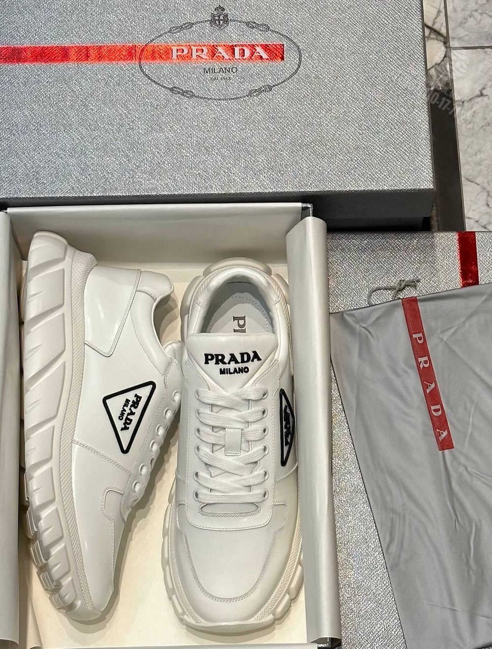 Кроссовки Prada